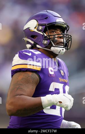 Minnesota Vikings fullback C.J. Ham (30) celebrates after his touchdown  with offensive tackle Brian O'Neill, right, in the second half of an NFL  football game against the Buffalo Bills, Sunday, Nov. 13