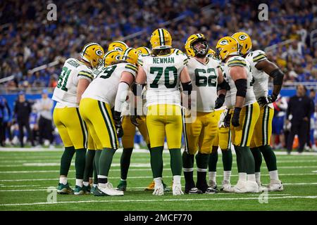 Green Bay Packers players huddle up during an NFL football game