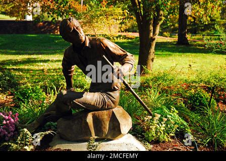 A Statue sculpture of Songwriter and Composer Stephen Foster in My Ol Kentucky Home State Park, at the site that inspired the song Stock Photo