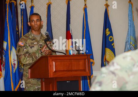 FORT MEADE, Md - Lt. Col. Chaveso Cook, the incoming commander for the Headquarters Command Battalion, gives his first remarks as the battalion commander during a formal change of command ceremony here, June 30. Cook celebrated the leadership and guidance of outgoing battalion commander Lt. Col. Stephen P. Ward, as well as gave his hopes and vision for the future of the unit. Stock Photo