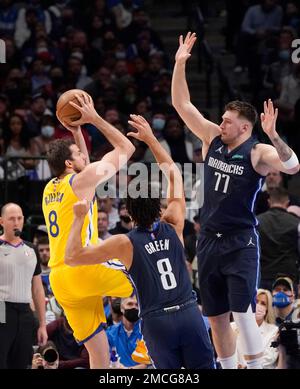 The Golden State Warriors' Nemanja Bjelica (8) guards against the Dallas  Mavericks' Luka Doncic (77) in the fourth quarter of Game 4 of their NBA  Western Conference finals playoff game at the