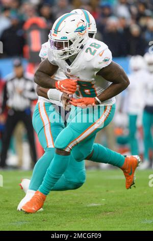 Miami Dolphins running back Duke Johnson (28) walks on the sidelines during  an NFL football game against the New York Jets, Sunday, Dec. 19, 2021, in  Miami Gardens, Fla. (AP Photo/Doug Murray