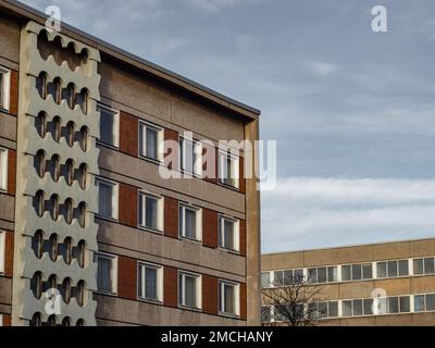 Prefabricated building facades in East Germany. Old abandoned dwelling houses with a lot of windows. The exterior is an exposed aggregate concrete. Stock Photo