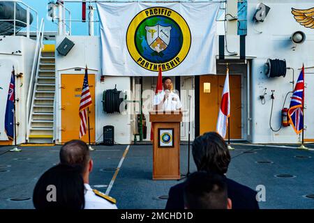 VUNG RO BAY, Vietnam (July 3, 2022) - Captain Hank Kim, Pacific Partnership 2022 (PP22) mission commander, gives remarks during the PP22 Vietnam closing ceremony aboard Military Sealift Command hospital ship USNS Mercy (T-AH 19). Now in its 17th year, Pacific Partnership is the largest annual multinational humanitarian assistance and disaster relief preparedness mission conducted in the Indo-Pacific. Stock Photo