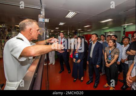 VUNG RO BAY, Vietnam (July 3, 2022) - Capt. Timothy Quast, Military Sealift Command hospital ship USNS Mercy (T-AH 19) commanding officer, briefs Mr. Marc Knapper, United States Ambassador to Vietnam, center left, during a tour of the casualty reception room of Mercy in support of the Pacific Partnership 2022 (PP22) Vietnam closing ceremony. Now in its 17th year, Pacific Partnership is the largest annual multinational humanitarian assistance and disaster relief preparedness mission conducted in the Indo-Pacific. Stock Photo