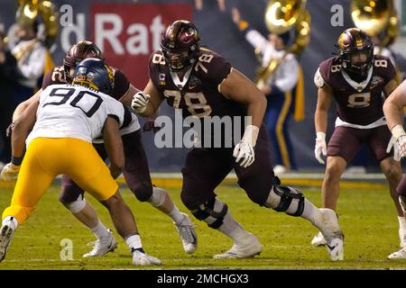 Minnesota offensive lineman Daniel Faalele (78) looks to make a block  during the first half of an NCAA college football game against Iowa,  Saturday, Nov. 13, 2021, in Iowa City, Iowa. (AP