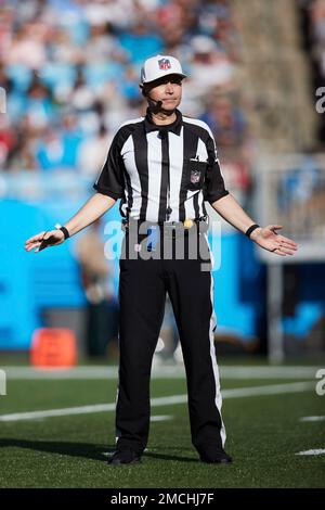 Referee Brad Allen (122) in a 'Crucial Catch' hat during an NFL