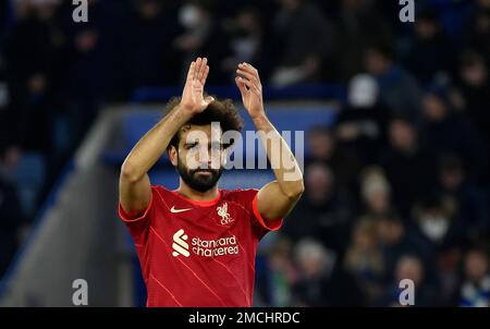 Liverpool's Mohamed Salah exchanges his shirt with a member of the crowd  for a present after the UEFA Champions League, Group C match at Anfield,  Liverpool Stock Photo - Alamy