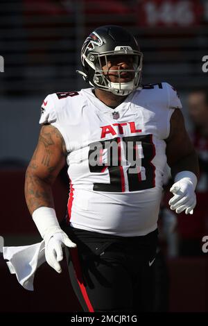 Atlanta Falcons defensive tackle Mike Pennel (98) walks off the