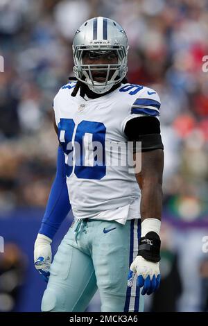 Dallas Cowboys defensive end Demarcus Lawrence (90) stands on the sideline  during an NFL football game against the New York Giants, Sunday, Dec. 19,  2021, in East Rutherford, N.J. The Dallas Cowboys