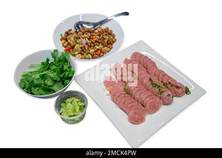 Die cut of Sliced sour pork, Peanuts and Coriander on white isolated. Stock Photo