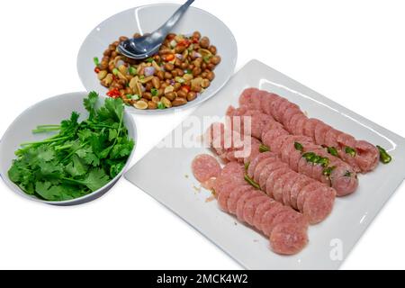 Die cut of Sliced sour pork, Peanuts and Coriander on white isolated. Stock Photo