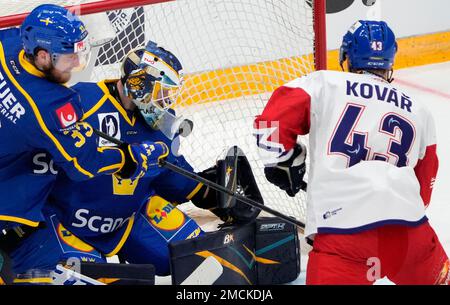 Goalie of Sweden Magnus Hellberg (left) and Yegor Sharangovich (right) of  Belarus in action during the Ice Hockey World Championships match Sweden  vs. Belarus in Copenhagen, Denmark., May 4, 2018. (CTK Photo/Ondrej