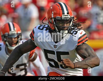 FILE - In this Aug. 8, 2019, file photo, Cleveland Browns defensive end  Chris Smith (50) sits on the sideline during the first half of an NFL  preseason football game against the