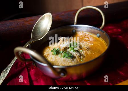 Korma, also qorma Kavurma or kurma, is a mild-flavored curry originating in India and Turkey, often made with yogurt sauce, heavy cream, or nuts. Stock Photo