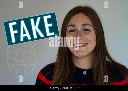 Deepfake concept matching facial movements with a different face of another woman in a photo. Face swapping or impersonation. Stock Photo