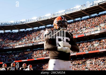 Cleveland Browns offensive tackle James Hudson III (66) walks back