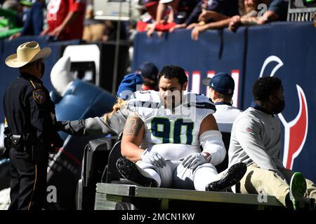 August 26 2022: Seattle Seahawks defensive tackle Bryan Mone (90) losses  his helmet during the 2nd half the NFL Football game between the Seattle  Seahawks and Dallas Cowboys at AT&T Stadium in