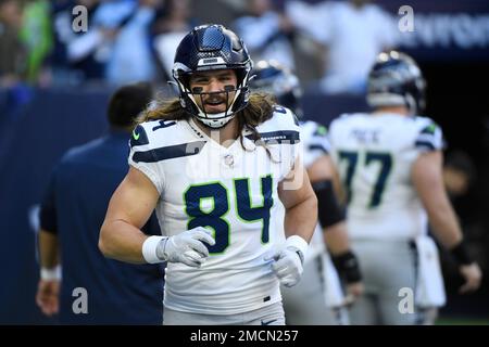 Seattle Seahawks tight end Colby Parkinson (84) stands on the field during  the first half of an NFL football game against the Los Angeles Rams,  Sunday, Jan. 8, 2023, in Seattle. (AP