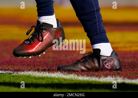 Star Wars themed cleats, painted by Sean Vergara, are worn by Dallas Cowboys  wide receiver Malik Turner was he works out prior to an NFL football game  against the Washington Football Team