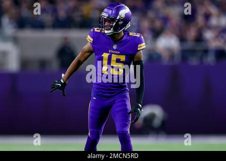 Minnesota Vikings wide receiver Ihmir Smith-Marsette (15) pulls in a pass  as Denver Broncos cornerback Donnie Lewis Jr. (39) covers during an NFL  preseason football game, Aug. 28, 2022, in Denver. (AP