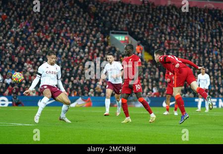 Liverpool's Andrew Robertson heads the ball during the Champions League  final soccer match between Liverpool and Real Madrid at the Stade de France  in Saint Denis near Paris, Saturday, May 28, 2022. (