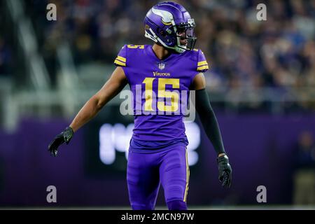 Minnesota Vikings wide receiver Ihmir Smith-Marsette (15) pulls in a pass  as Denver Broncos cornerback Donnie Lewis Jr. (39) covers during an NFL  preseason football game, Aug. 28, 2022, in Denver. (AP