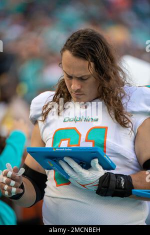 Miami Dolphins center Austin Reiter (61) on the sidelines during an NFL  football game against the Atlanta Falcons, Sunday Oct 24, 2021, in Miami  Gardens, Fla. (AP Photo/Doug Murray Stock Photo - Alamy