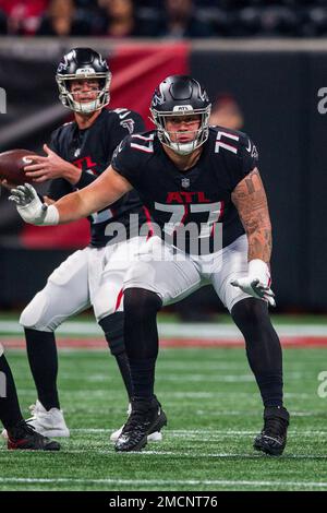 Atlanta Falcons offensive tackle Jalen Mayfield (77) looks for a block  during the first half of an NFL football game against the Dallas Cowboys in  Arlington, Texas, Sunday, Nov. 14, 2021. (AP