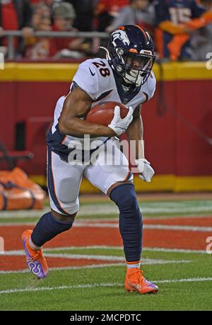 Denver Broncos' Damarea Crockett (28) follows a play during the second half  of an NFL football game against the Jacksonville Jaguars, Sunday, Sept. 19,  2021, in Jacksonville, Fla. (AP Photo/Phelan M. Ebenhack