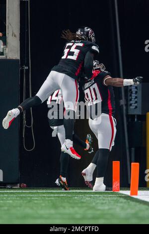 Atlanta Falcons defensive end Marlon Davidson (90) celebrates a touchdown  with outside linebacker Steven Means (55) during the first half of an NFL  football game against the Tampa Bay Buccaneers, Sunday, Dec.