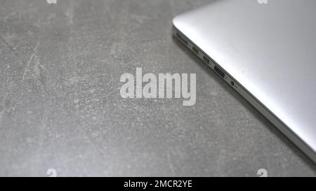 freelancer working on laptop at home-office. Close up of female hands opening and closing computer with one hand. Businesswoman writing business Stock Photo