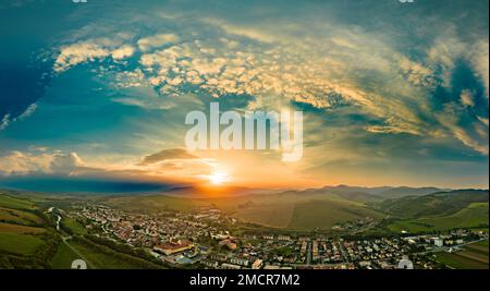 Aerial drone view of Podolinec, the town near Stara Lubovna, Slovakia, during sunset Stock Photo