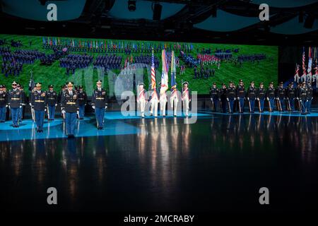 U.S. Army officers present a ceremonial knife during the graduation of ...