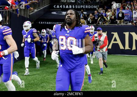 Buffalo Bills defensive tackle Brandin Bryant, left, and defensive tackle  Eli Ankou walk off the field after a preseason NFL football game against  the Denver Broncos in Orchard Park, N.Y., Saturday, Aug.