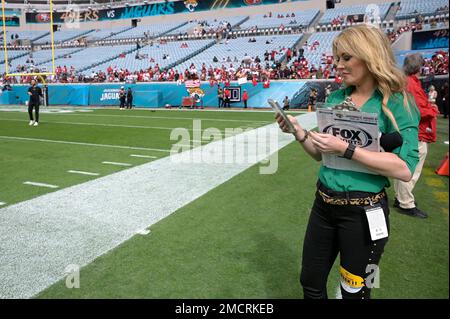 Fox Sports NFL sideline reporter Jen Hale prepares to go on the