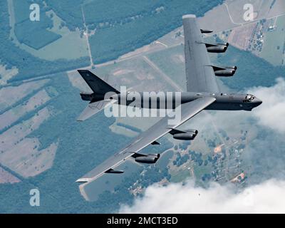 A B-52 Stratofortress with the 307th Bomb Wing, Louisiana flies away from the boom of a KC-135 Stratotanker, with the 914th Air Refueling Wing, New York July 9, 2022 over Southern United States. The KC-135 had spouses of the 307th Maintenance Group on board that were able to watch the refueling. Stock Photo