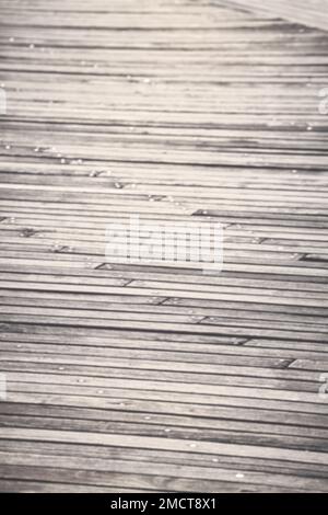 Blurred photo of a wooden boarded floor, abstract background or wallpaper. Stock Photo