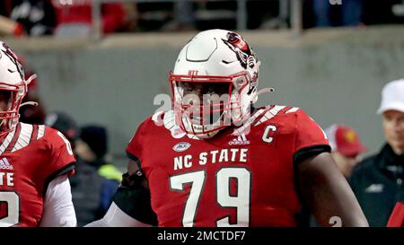 North Carolina State offensive tackle Ikem Ekwonu stands with NFL  Commissioner Roger Goodell after being picked by the Carolina Panthers with  the sixth pick of the NFL football draft Thursday, April 28