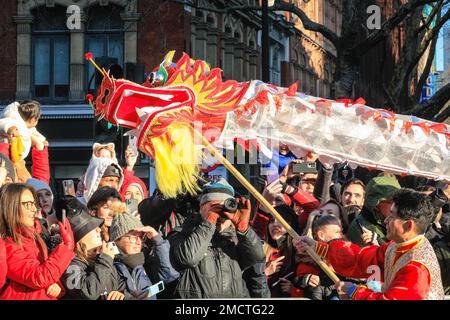 London, UK. 22nd Jan, 2023. Performers participate in the Chinese New Year Parade in colourful costumes whilst people watch. The vibrant parade, which features traditional handcrafted lion and dragon dances, returns to the streets of Soho and Chinatown for the Festival of Spring celebrations. 2023 is the year of the rabbit. Credit: Imageplotter/Alamy Live News Stock Photo