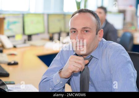 man posing in the computer laboratory Stock Photo