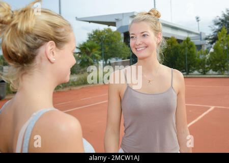 women on the tennis court Stock Photo