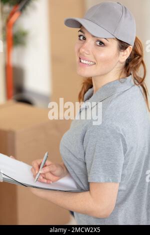 professional movers doing home relocation Stock Photo