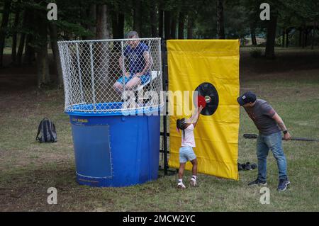 Dunk Tank Raffle On July 9, the 510th Regional Support Group brought their families ...