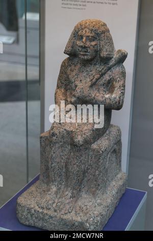 Granite statue of Ankhwa at the British Museum in London, UK Stock Photo