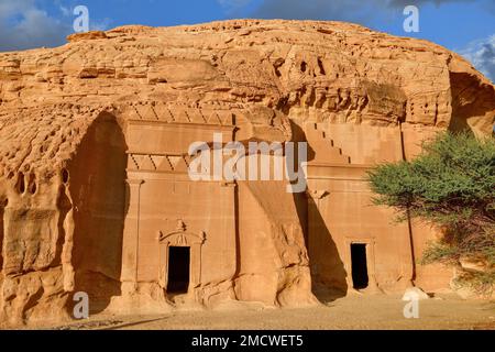 Nabataean tombs at the rock Qasr Al-Bint, Hegra or Madain Salih, AlUla region, Medina province, Saudi Arabia, Arabian Peninsula Stock Photo