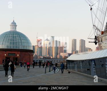 Dome shape entrance to the Greenwich Foot Tunnel with part of the Cutty Sark ship right, London England Stock Photo