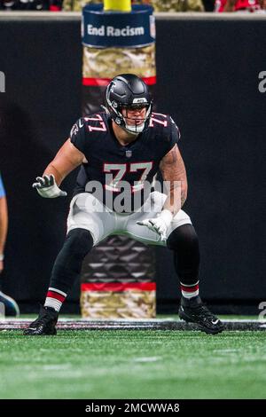 Atlanta Falcons offensive tackle Jalen Mayfield (77) looks for a block  during the first half of an NFL football game against the Dallas Cowboys in  Arlington, Texas, Sunday, Nov. 14, 2021. (AP