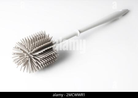 modern toilet brush with silicone bristles on white background Stock Photo