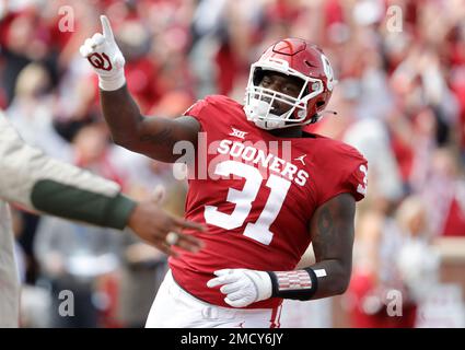 Oklahoma defensive lineman Jalen Redmond (31) celebrates after returning a  fumble for a touchdown against Iowa State during the first half of an NCAA  college football game Saturday, Nov. 20, 2021, in Norman, Okla. (AP  Photo/Alonzo Adams Stock Photo